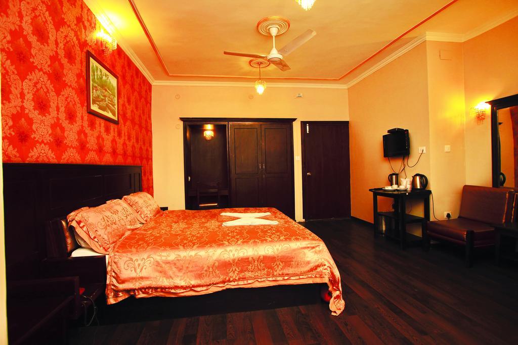 Hotel Pride Continental Srīnagar Habitación foto